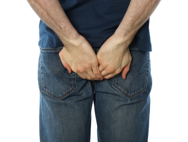man-holding-his-butt-isolated-on-white-background-2025-03-25-06-28-36-utc (1)